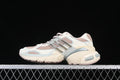 Side view of cream, pink and pale blue-gray Adidas Adistar XLG sneaker