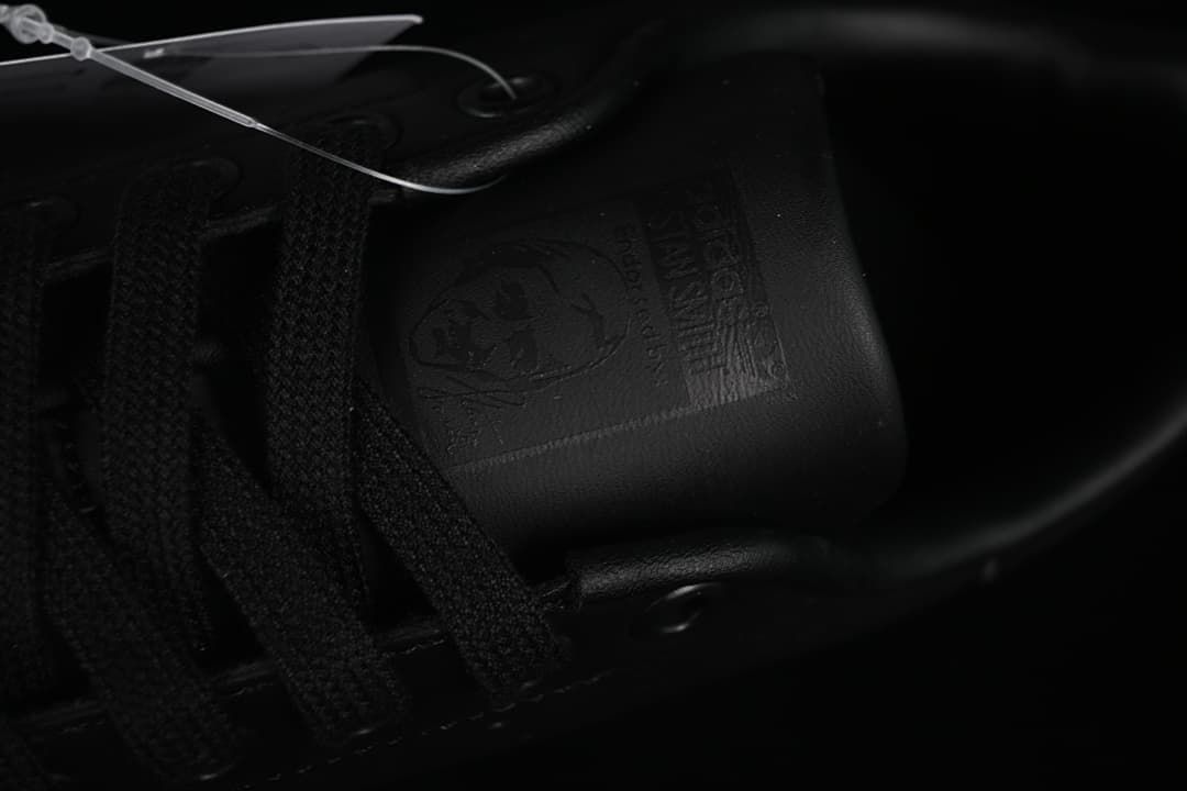 Close-up of embossed graphics on the tongue