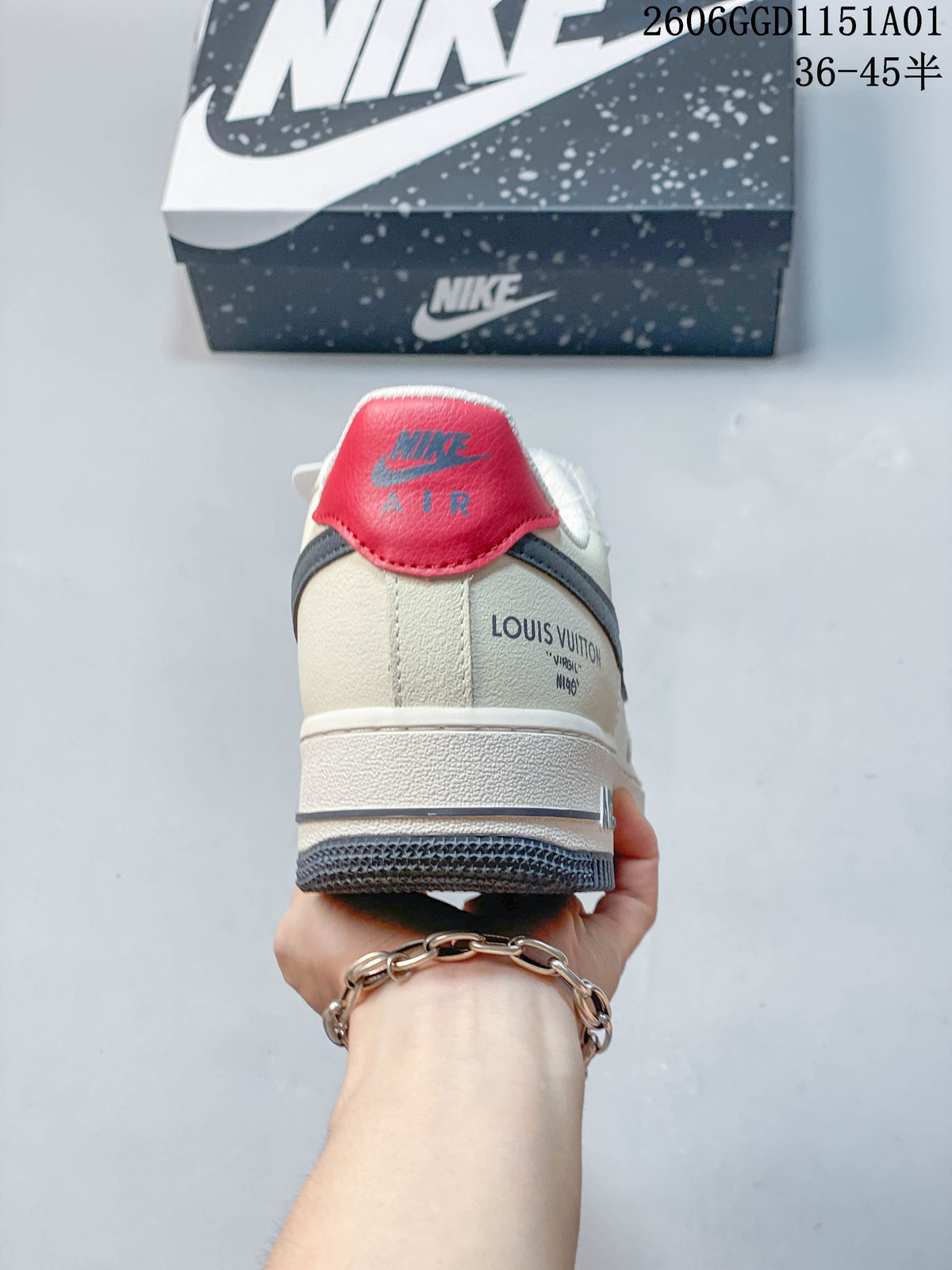 Rear view of a Nike Air Force 1 '07 LV8 sneaker showing its red heel tab and printed heel detail.