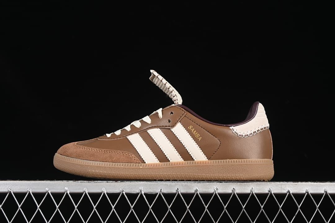 Side profile of a brown and cream sneaker with a gum outsole