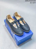 Pair of dark adidas Samba Jane Mary Jane sneakers with T-strap closures and gum-colored soles