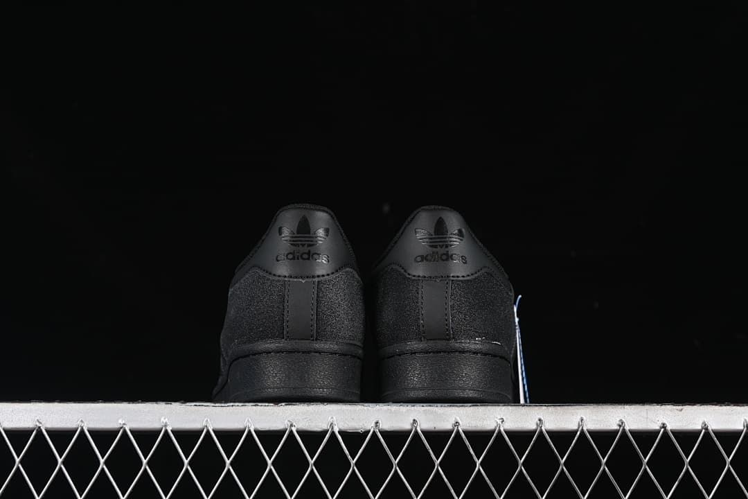 Rear view of the pair with tonal Trefoil heel branding