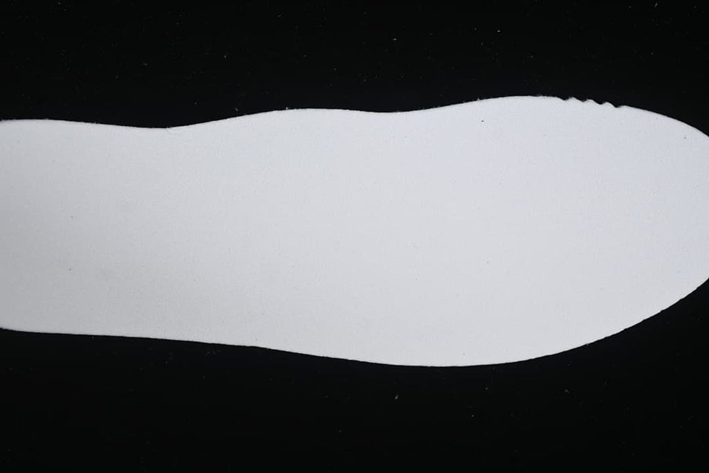 White shoe insole shown from above
