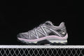 Side view of grey Salomon XT-Quest trail shoes with plum-pink accents and a rugged sole