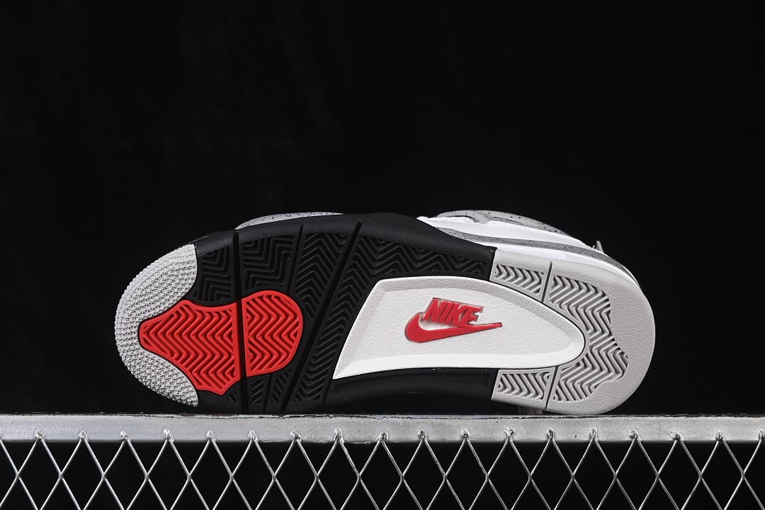 Underside view showing the black, grey, white and red outsole