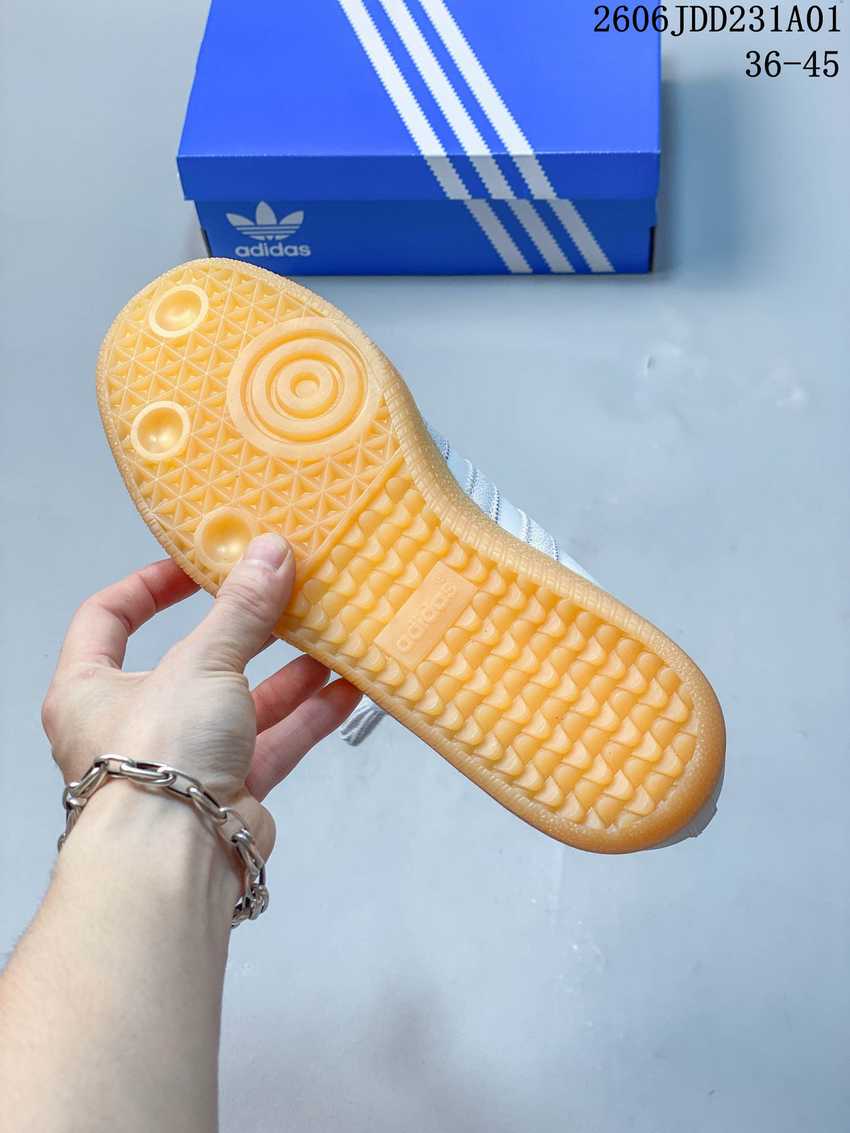 Close view of the gum-colored outsole with patterned tread.