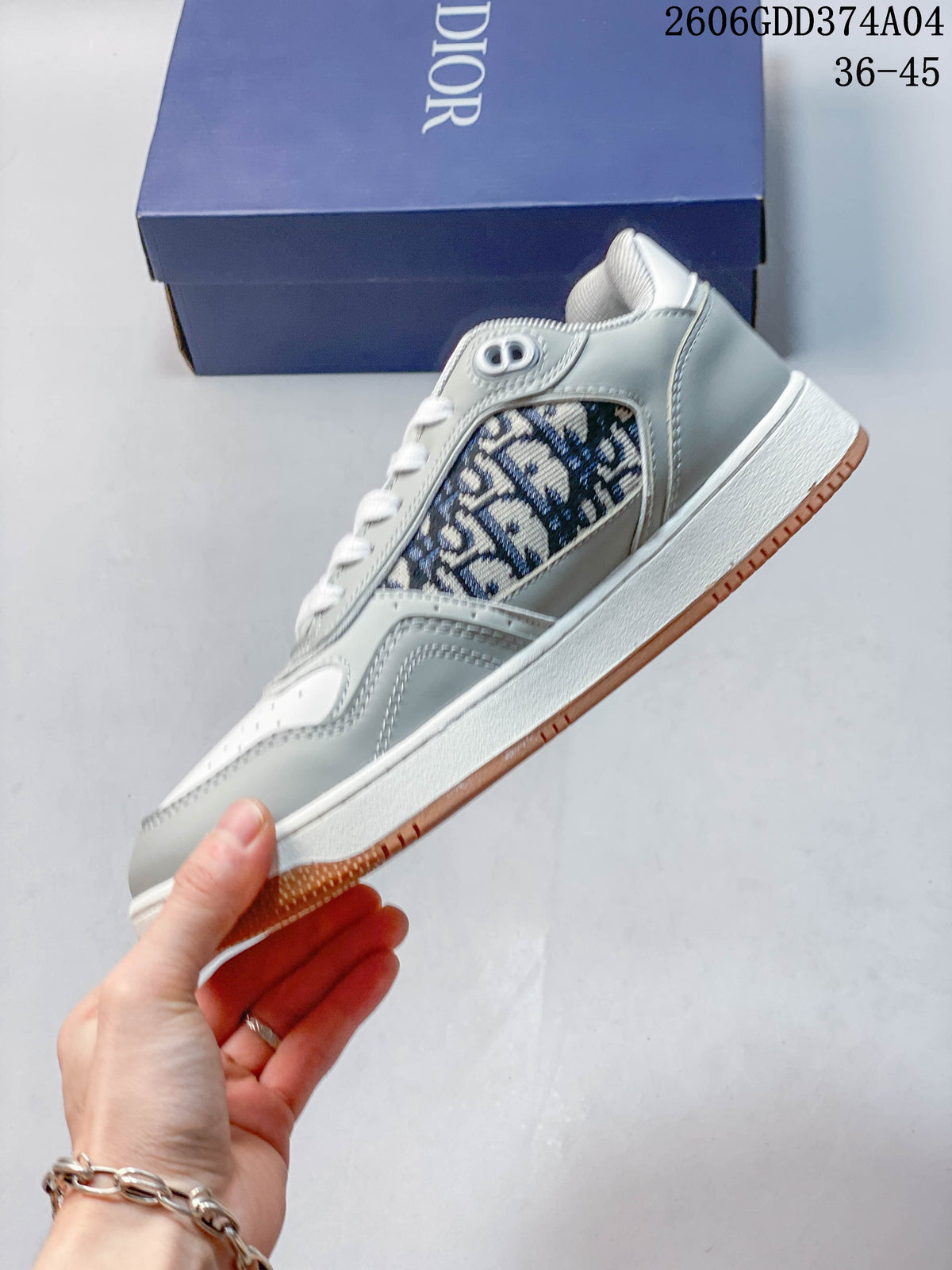 Side view showing the patterned panel, gray overlays and gum-colored outsole