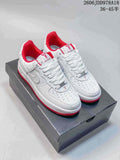 Pair of white Nike Air Force 1 low-top sneakers with red accents, textured panels, and Kobe-themed details, shown on a box.