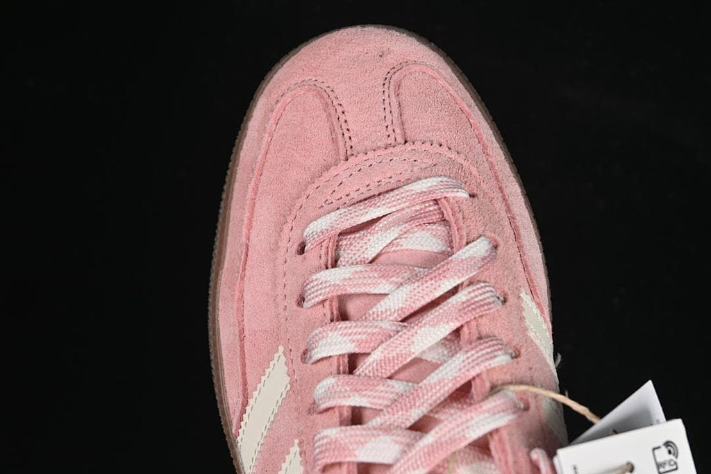 Top view of the pink suede-look toe and lacing