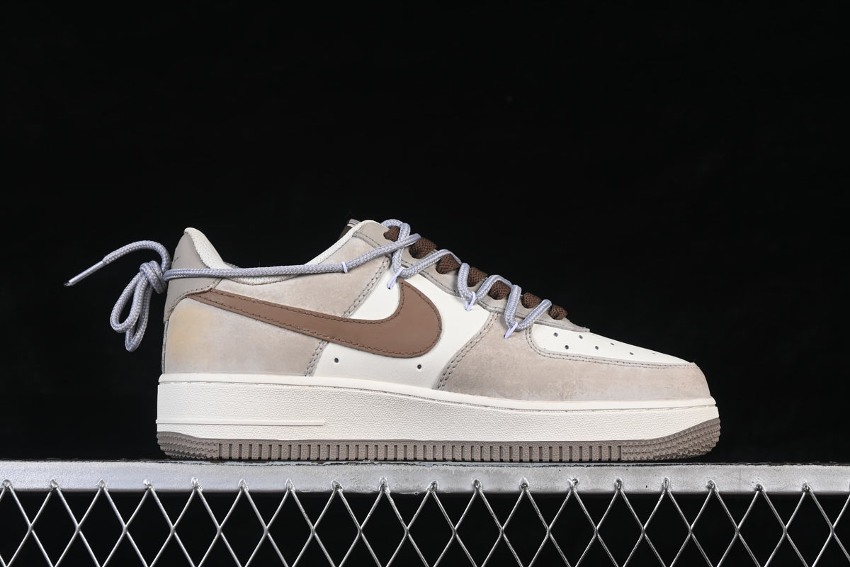 Side profile of the low-top sneakers with pale laces and layered design