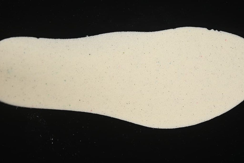 Close-up of a light-colored shoe insole.