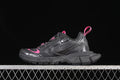 Side view of dark grey Balenciaga 3XL Ripstop sneakers with pink accents.