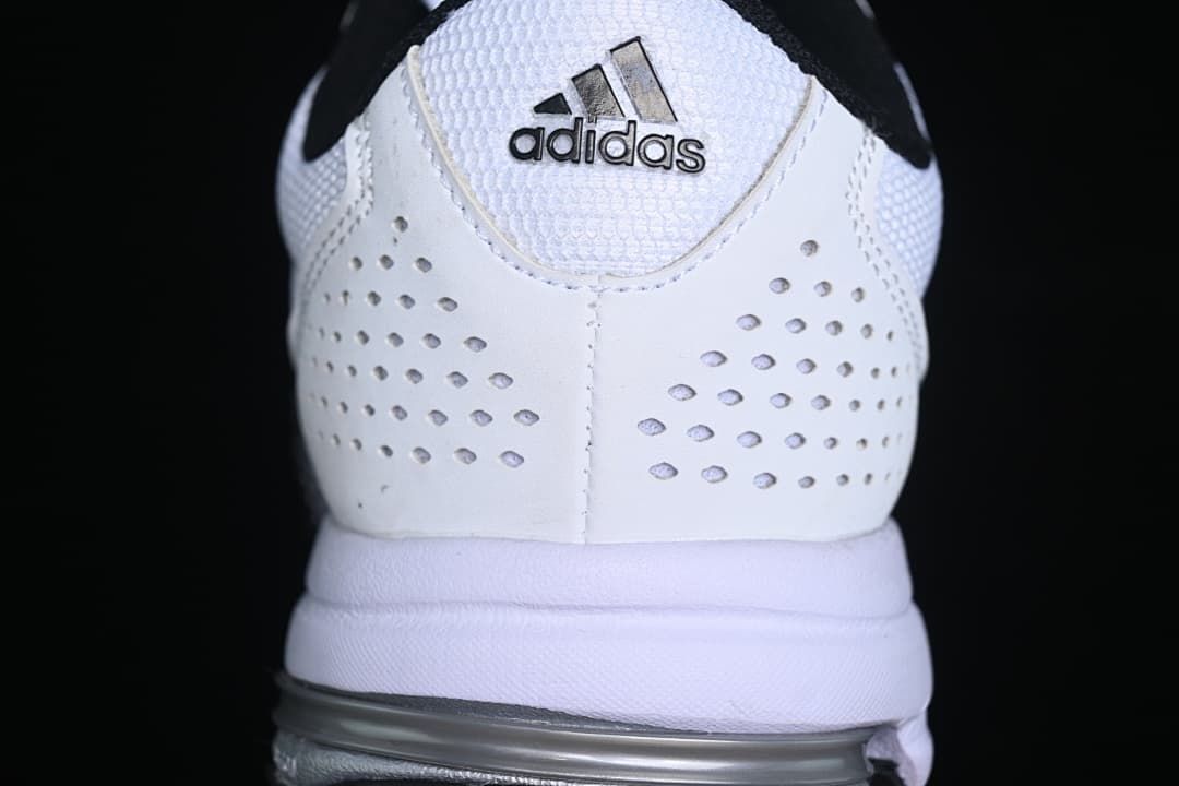 Rear view showing perforated heel panels and adidas branding