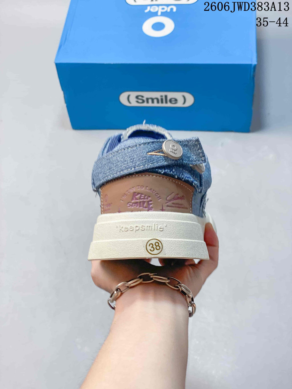 Rear view of an Ocai Smile sneaker showing a size 38 marking on the heel.