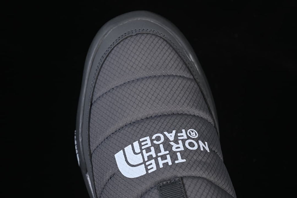 Top view of the shoe's quilted upper