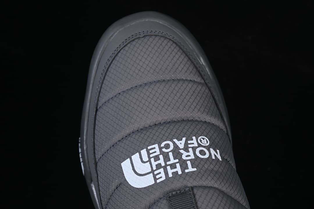 Top view of the shoe's quilted upper