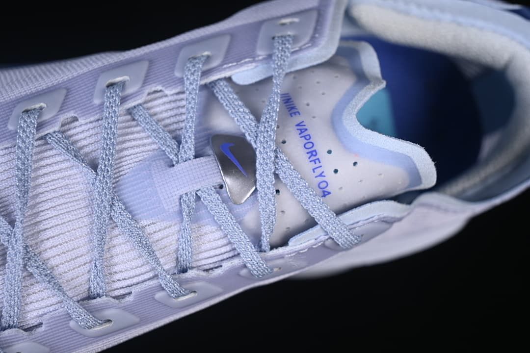 Top detail of the laces and tongue marked Vaporfly 04