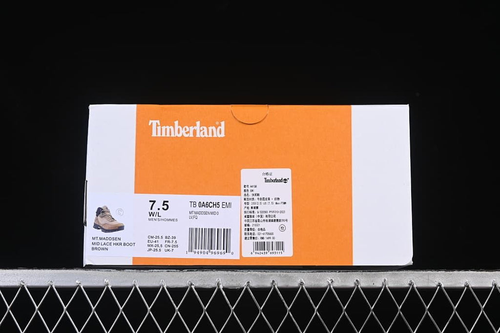 Timberland box label identifying the Mt. Maddsen Mid Lace Hiker Boot in brown, style TB0A6CH5EMI.