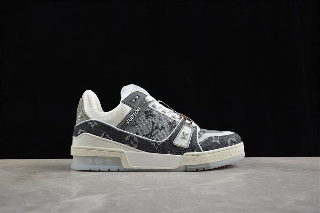 Side profile showing the patterned upper, white laces, and layered sole.