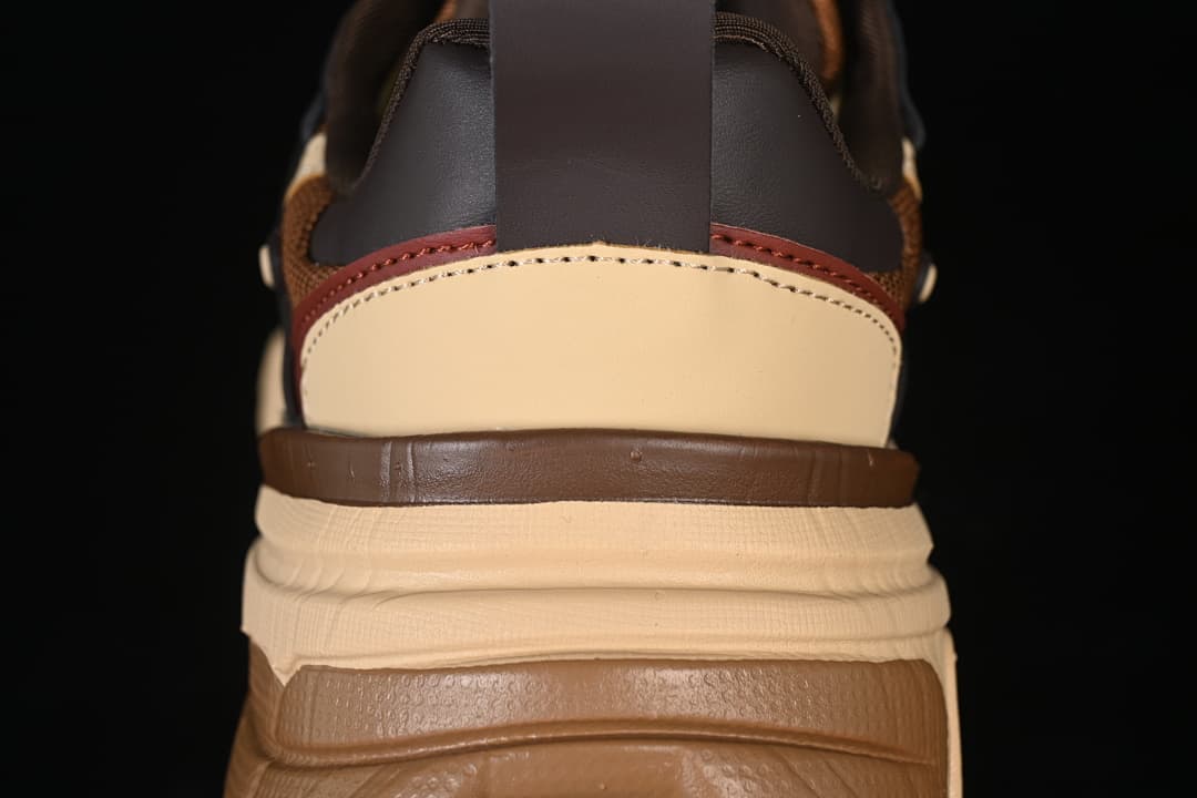 Rear view highlighting the layered heel and sculpted sole