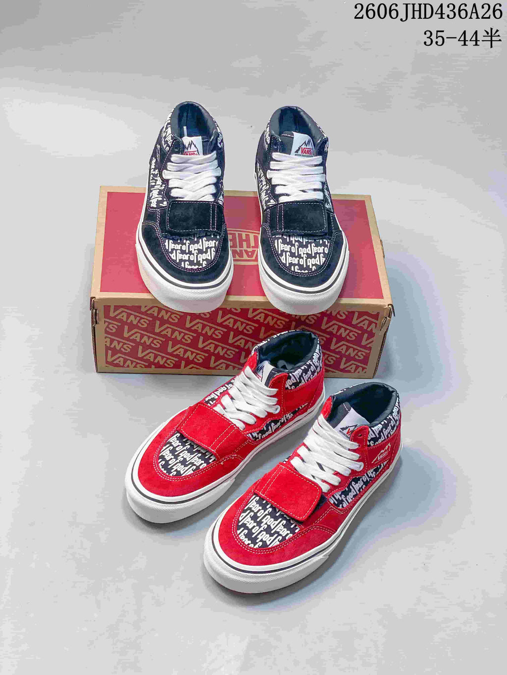Navy and red colorways of printed Vans sneakers shown together on and beside a shoe box.