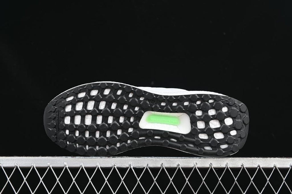 Underside view showing the black patterned outsole.