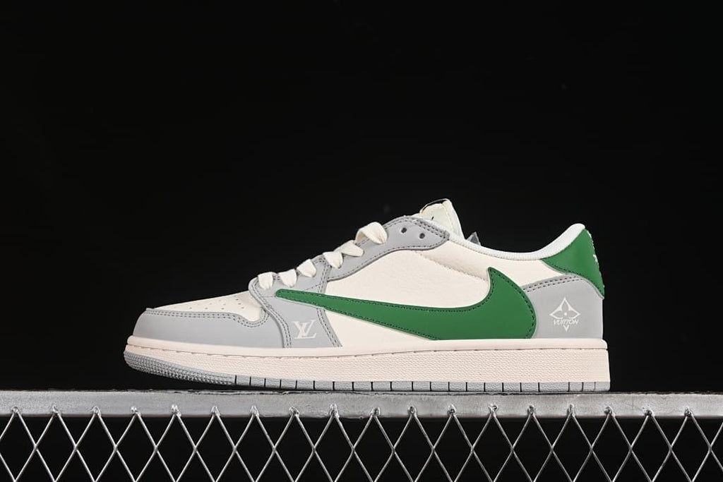 Side view of a grey, white, and green low-top sneaker