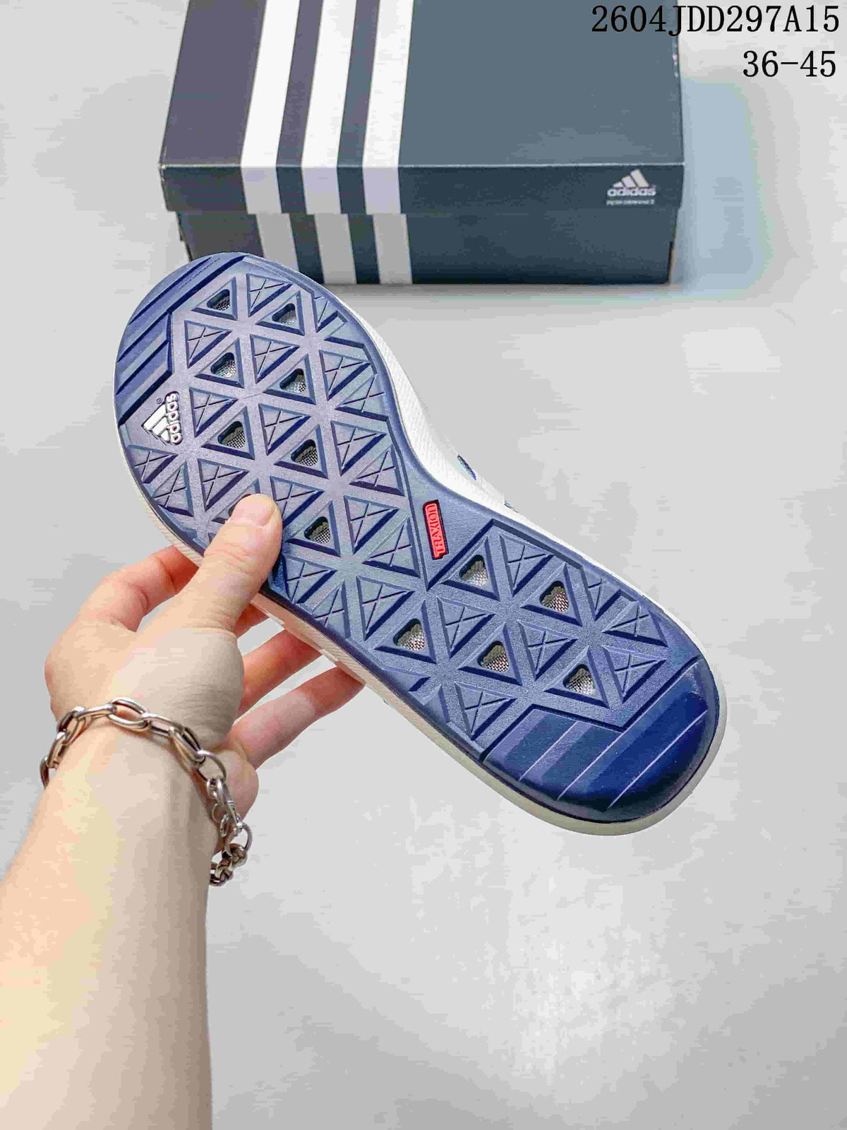 Geometric tread pattern on the outsole of a blue adidas Terrex CC Boat shoe