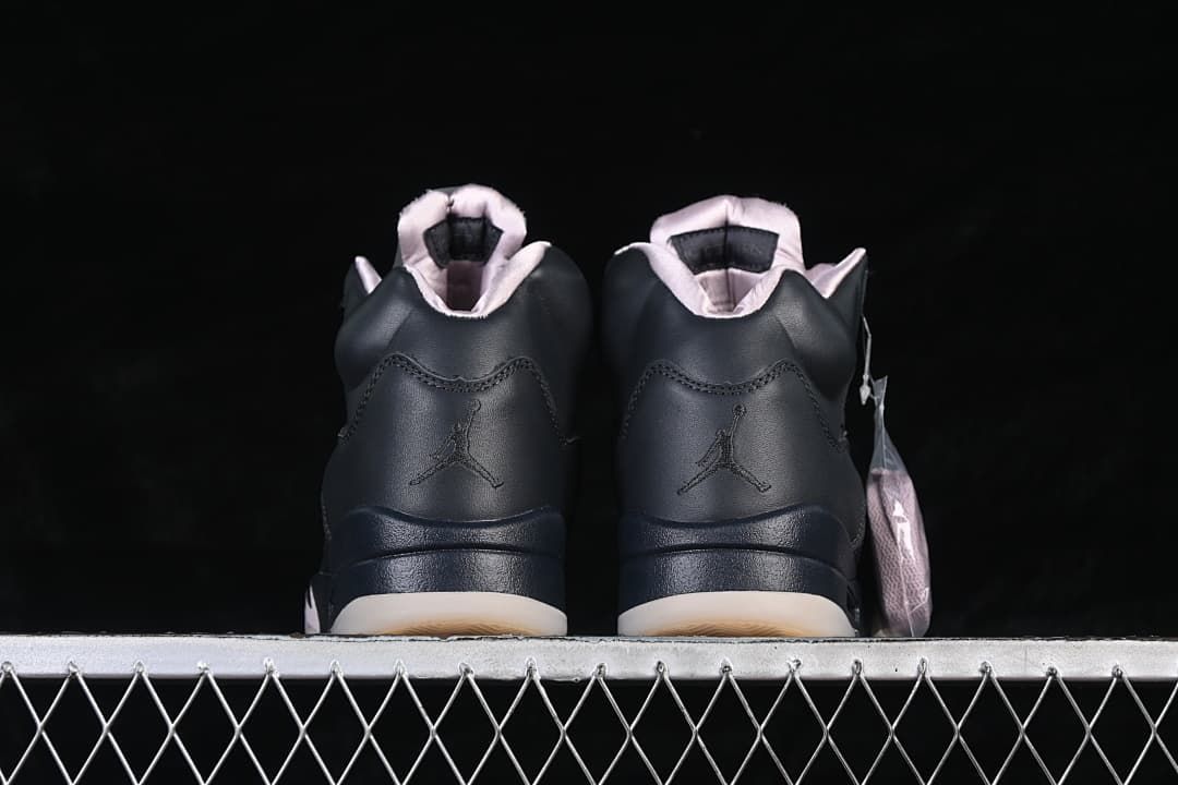 Rear view of the pair showing heel logos and pale-colored collar lining