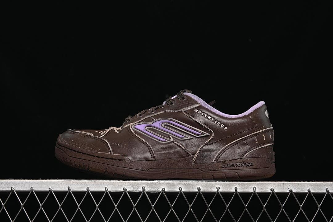Side view of the dark brown sneaker with lavender accents