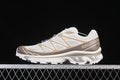 Side view of Salomon XT-6 sneakers in light neutral tones with beige and mauve-gray accents.