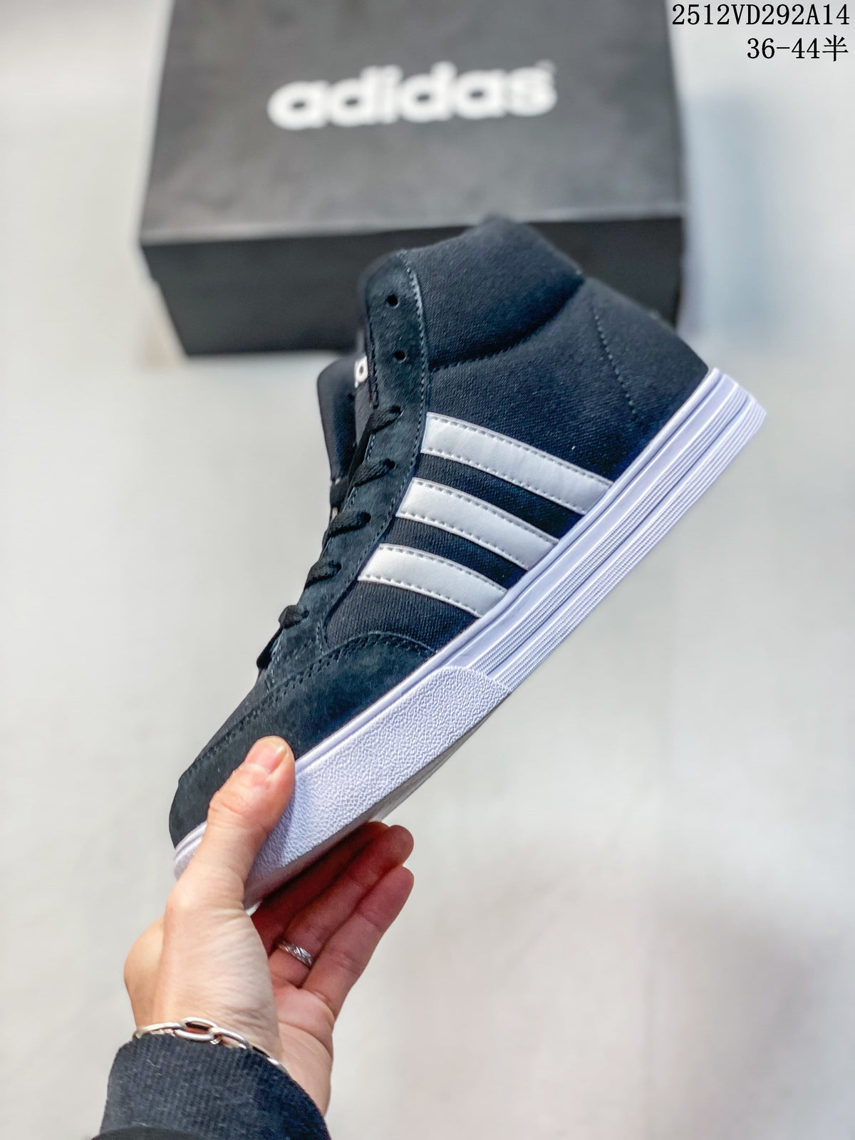 Side view of the navy Adidas high-top sneaker with three white stripes
