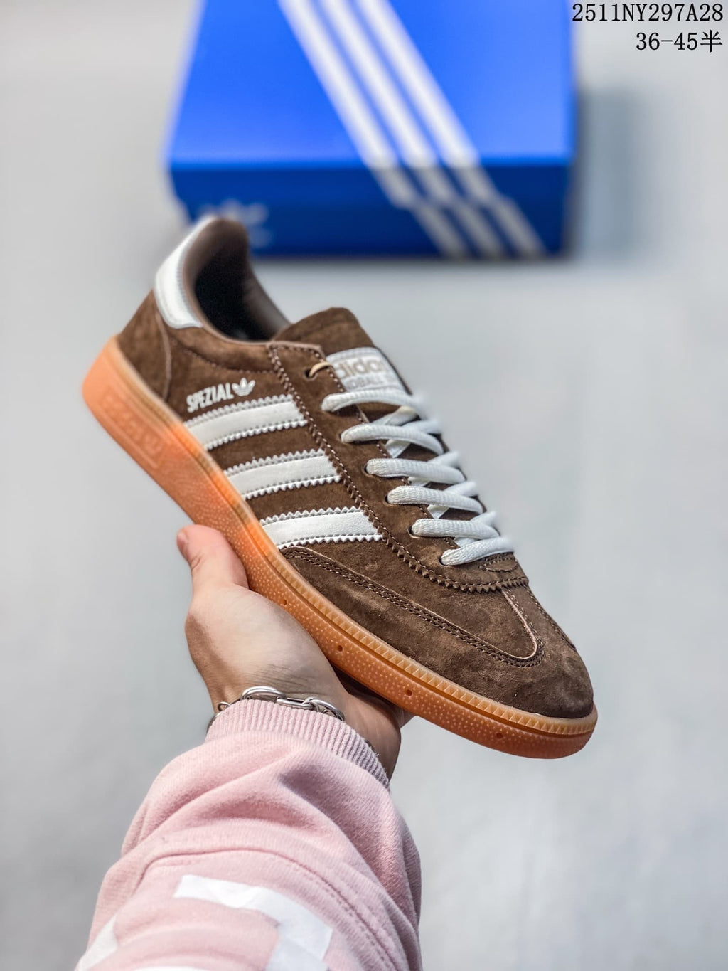 Brown adidas Handball Spezial sneaker with white stripes and a gum outsole
