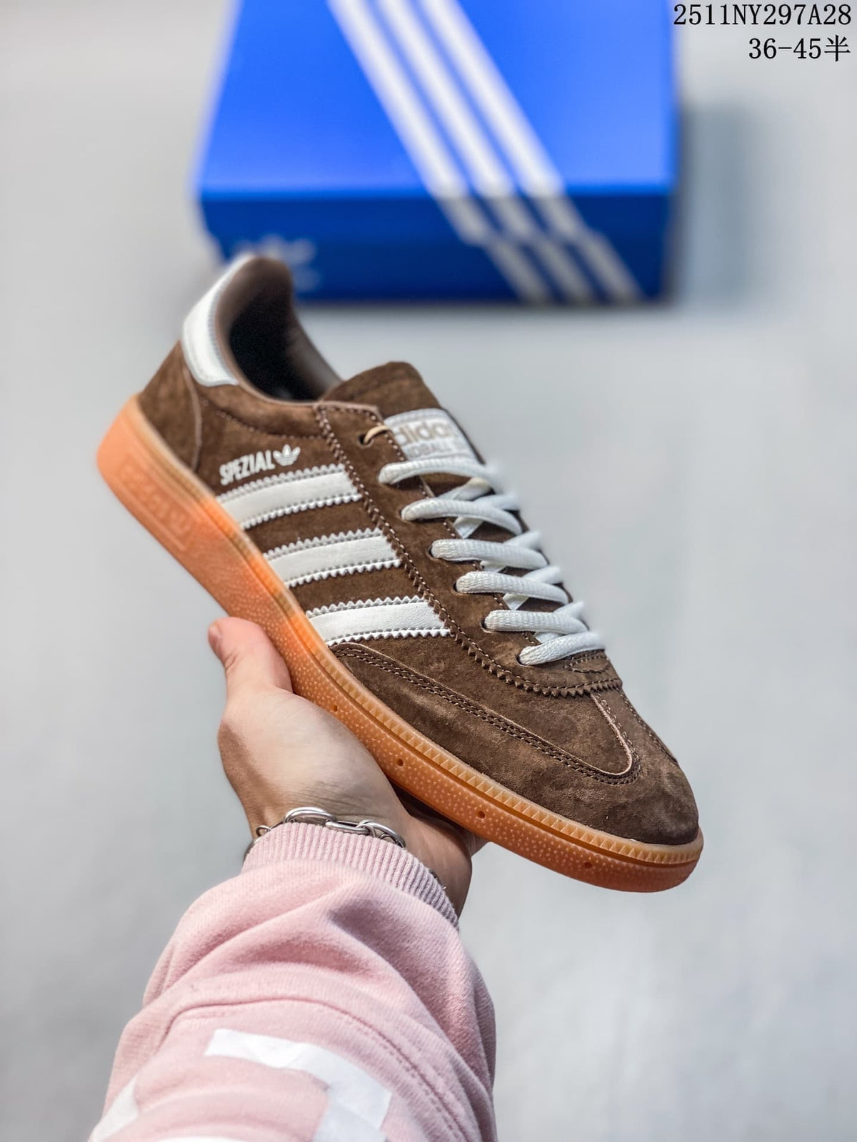 Brown adidas Handball Spezial sneaker with white stripes and a gum outsole