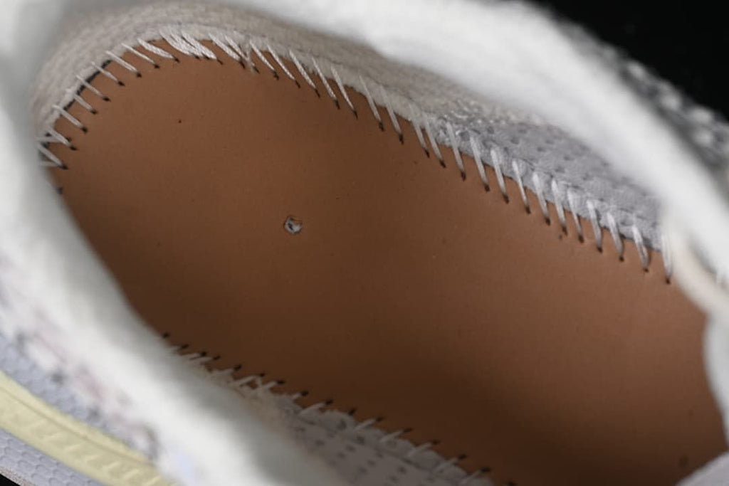 Interior view of the sneaker showing stitched construction