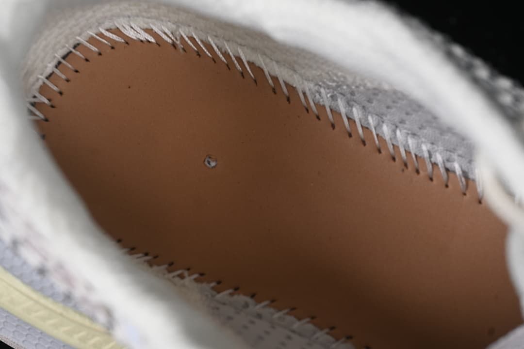 Interior view of the sneaker showing stitched construction