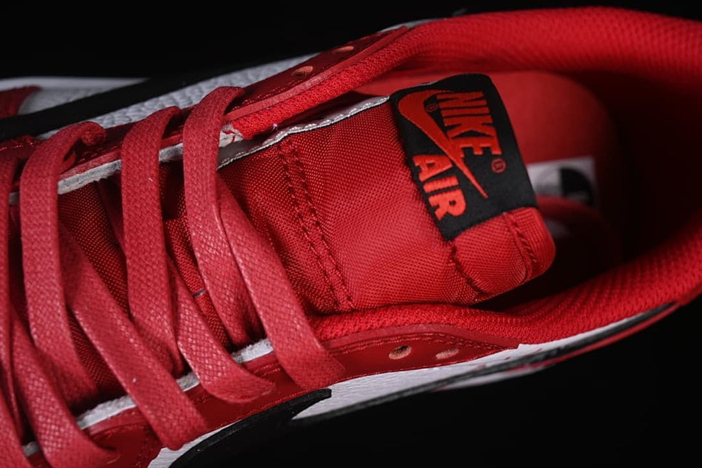 Close-up of red laces and Nike Air tongue label