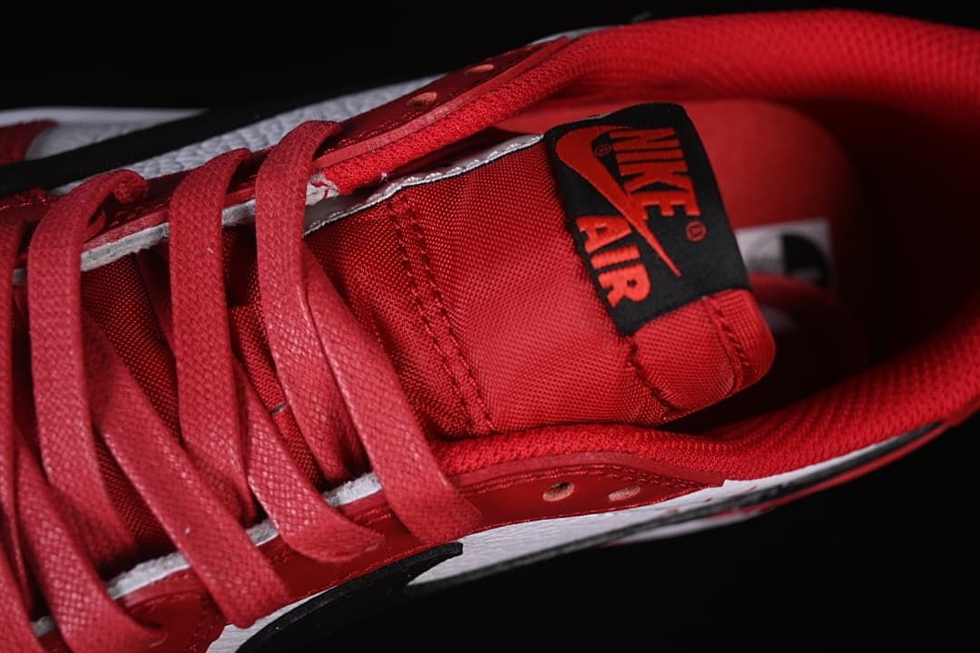 Close-up of red laces and Nike Air tongue label