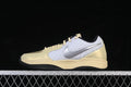 Side view of pale yellow, white, and silver Nike Ja 2 basketball shoe