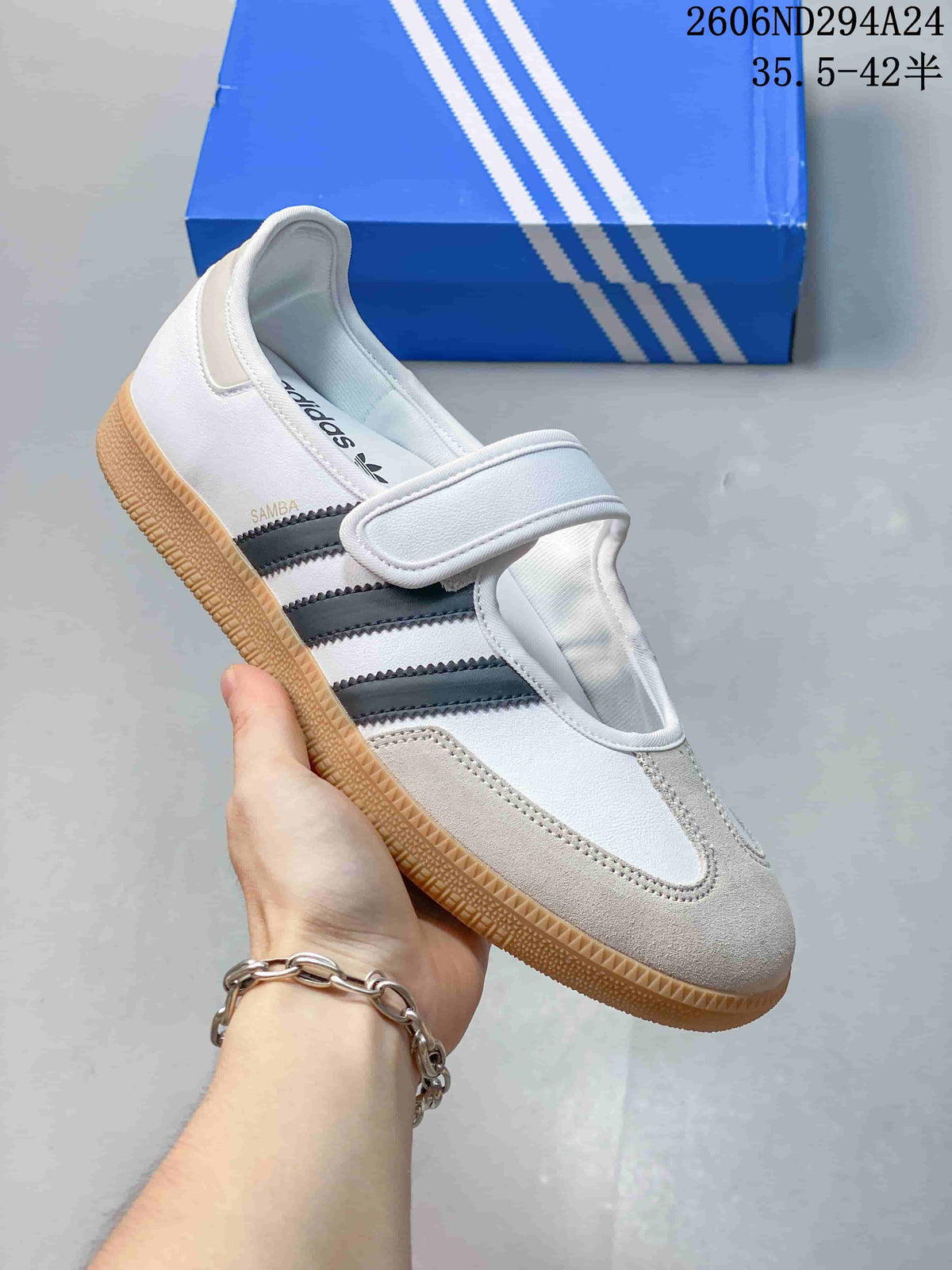 White and light gray adidas Samba Jane sneaker with dark stripes and gum outsole