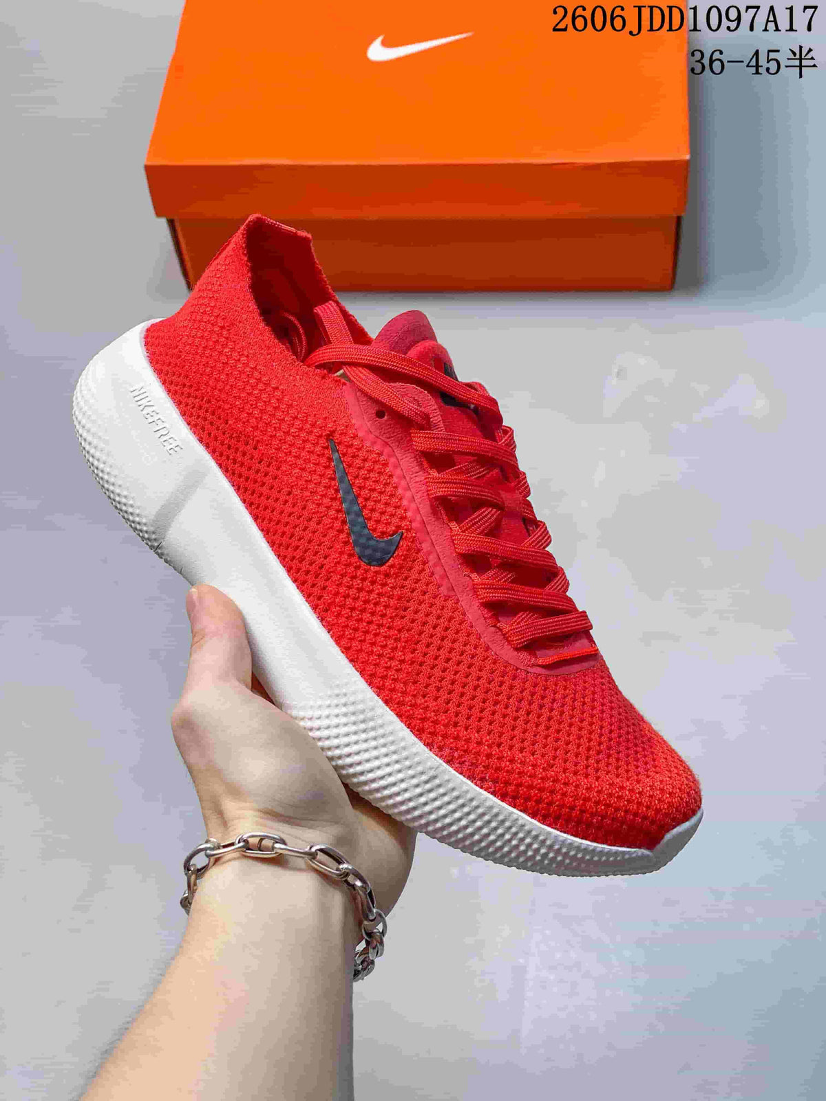 Red Nike Free 2025 low-top shoe with a dark Swoosh and white sole.