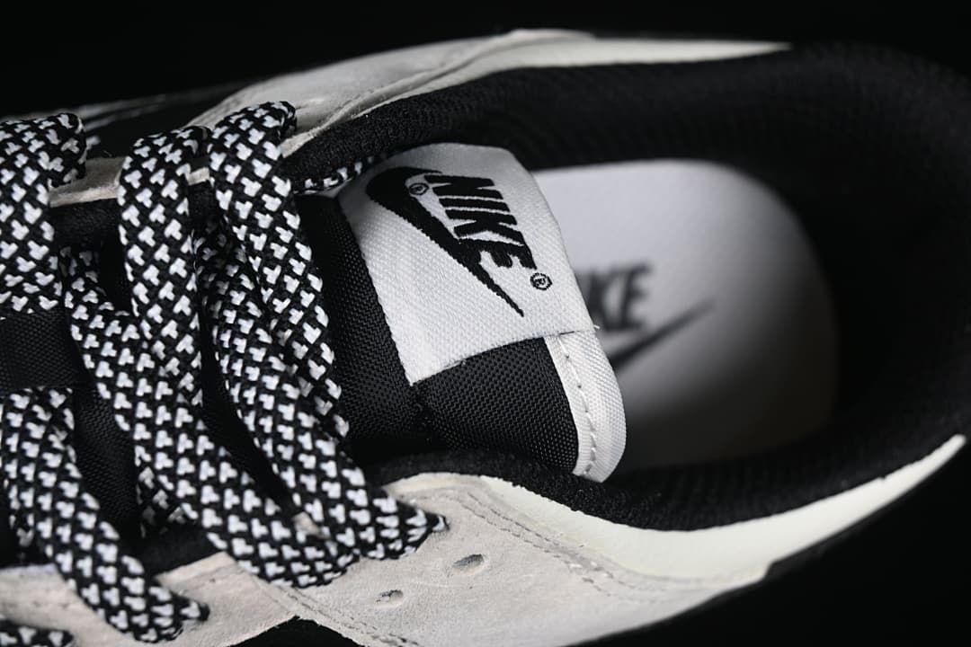 Close-up of the tongue label and black-and-white patterned laces
