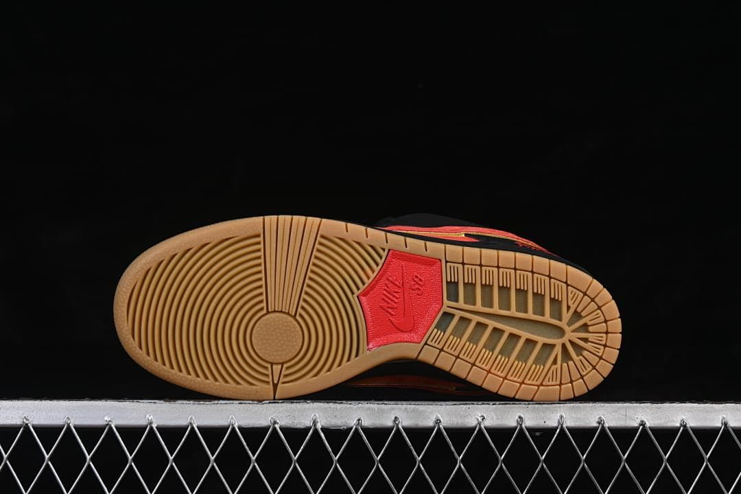 Underside view showing the gum-colored outsole tread and red central insert.