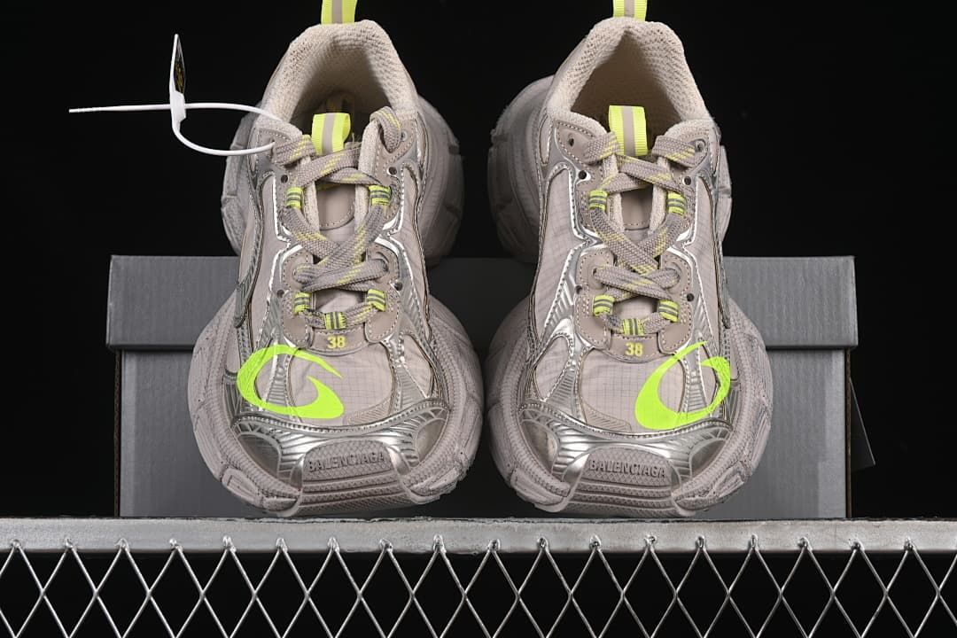 Front view of the pair showing the chunky toe and fluorescent yellow accents