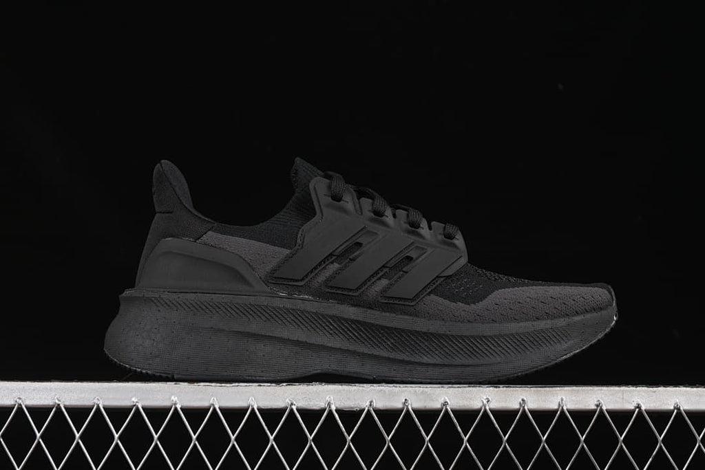 Side profile of the black sneaker