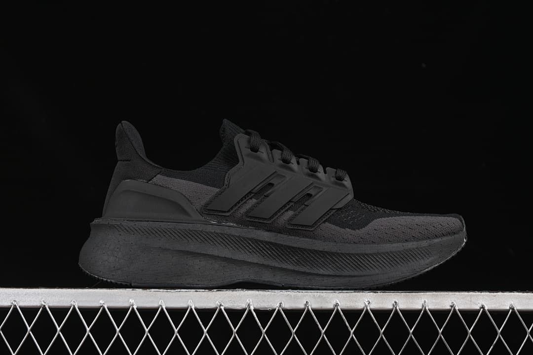 Side profile of the black sneaker
