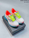 Pair of white Saucony Endorphin Speed 5 running shoes with neon yellow-green laces, coral lining, and turquoise soles