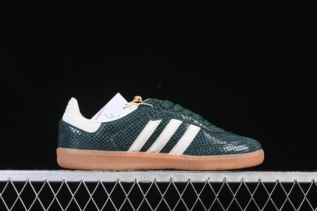 Side profile of a green Samba OG sneaker with white stripes