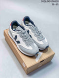 Pair of white, grey, and navy Veja low-top sneakers on a box; image overlay reads 36–45.