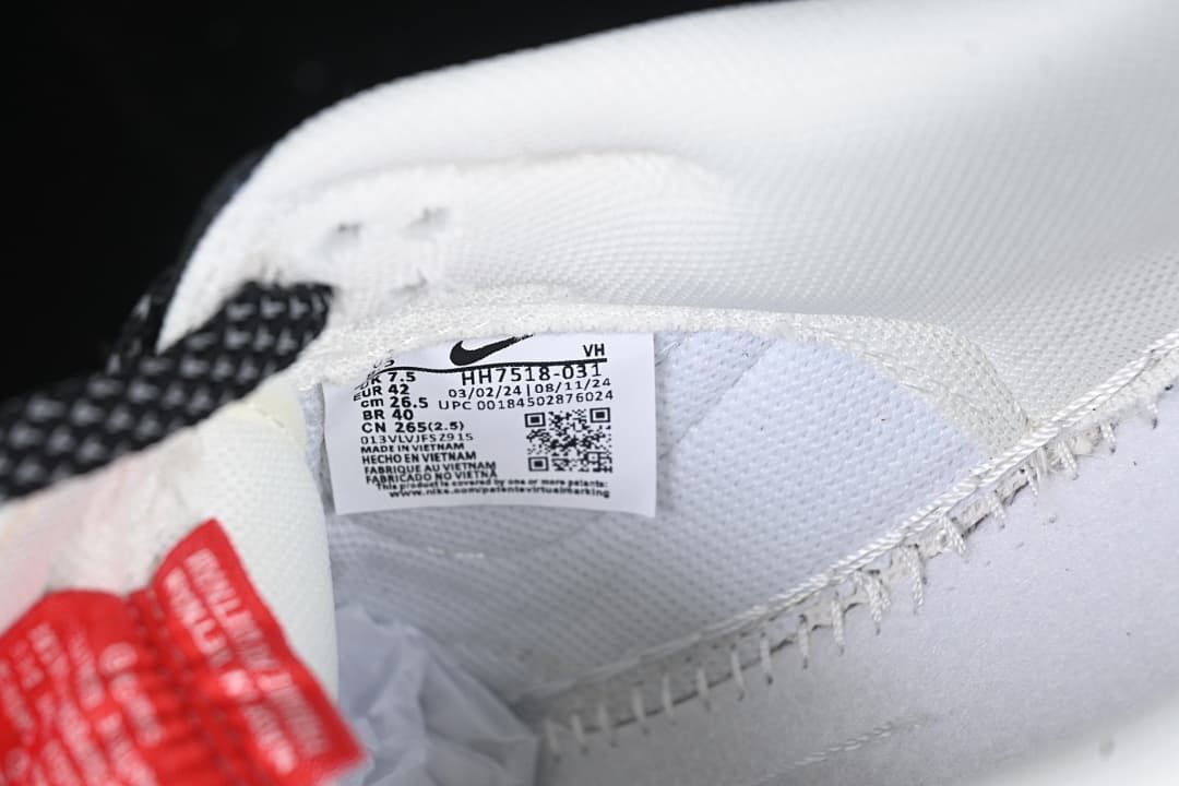 Interior size label showing EU 42 and style code HH7518-031